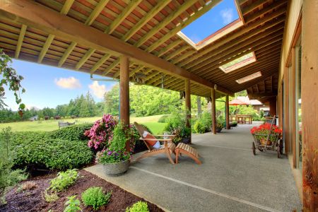 What are the benefits of professional patio cleaning for outdoor spaces